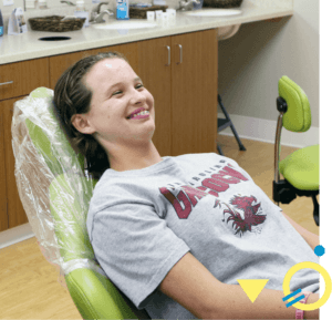 teen with braces smiling