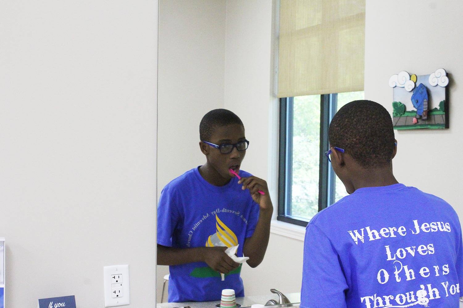 patient brushing teeth